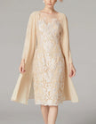 FJØRNA apricot chiffon mini dress for women with long sleeves, bodycon fit, and embroidered details.