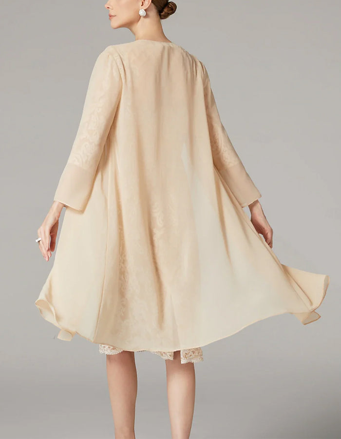 FJØRNA apricot chiffon mini dress for women with long sleeves, bodycon fit, embroidered details, perfect for elegant occasions