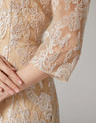 FJØRNA apricot chiffon mini dress for women with long sleeves and embroidered details, bodycon fit, elegant and stylish for special occasions.