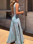 FJØRNA women's tie-dye print maxi dress with hollow slit detail, perfect for summer, featuring vibrant colors and flowing fabric.