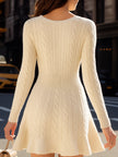 FJØRNA cozy cable knit sweater dress with V-neck and flare hem, mini length, perfect for casual or stylish winter wear