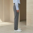FJØRNA men's straight leg trousers with tailored relaxed fit, shown in a neutral fabric, front view of the pants.