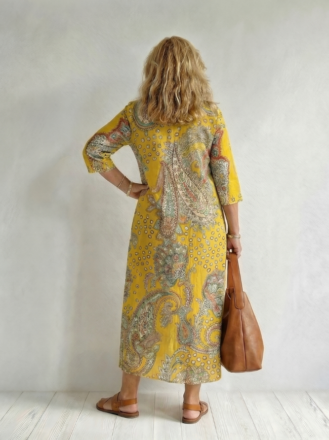 FJØRNA summer midi dress for women with paisley pattern and long sleeves, stylish and flowy for warm weather.