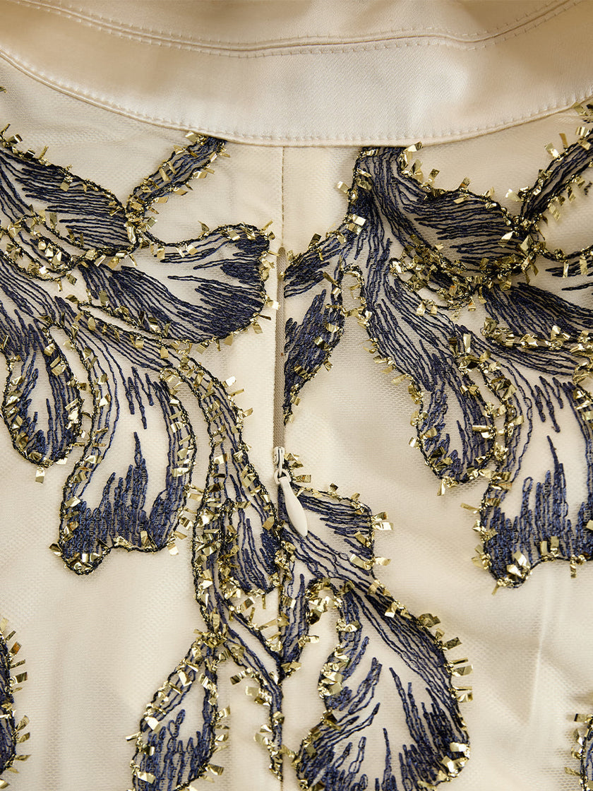 Silver embroidered mesh midi dress with metallic leaf motif by FJØRNA, featuring intricate embroidery and a sleek, elegant design.