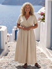 FJØRNA women's summer midi dress with v-neck, short sleeves, wrap style, flowy fabric, suitable for warm weather.