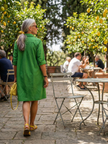 FJØRNA women's summer dress, lightweight wrap style with flowing, breathable fabric, perfect for warm weather.