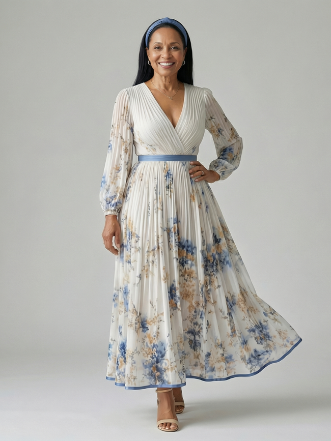FJØRNA women's floral summer midi dress with long sleeves, lightweight fabric, and a flowing silhouette for warm weather.