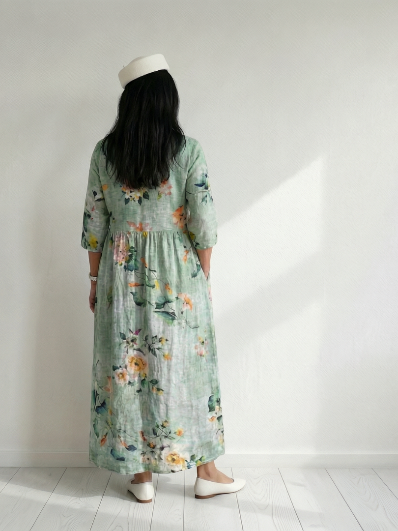 FJØRNA women's floral summer midi dress with long sleeves, flowy lightweight fabric, perfect for warm-weather occasions.