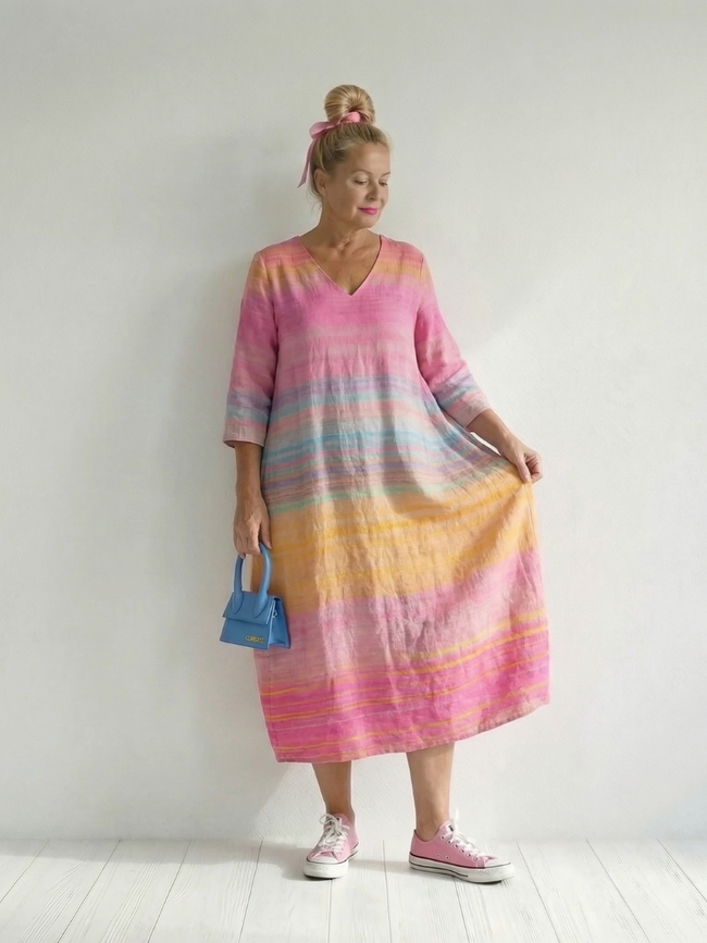 FJØRNA women's summer midi dress with striped pattern, long sleeves, flowy design, and breathable fabric, perfect for warm weather.