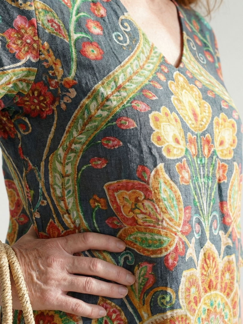 FJØRNA women's summer midi dress with long sleeves, wrap design, flowy lightweight fabric, perfect for warm weather.