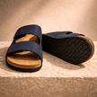 FJØRNA men's red cushioned sandals showing open-toe design with comfortable straps and textured soles.