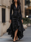 Midnight blue satin maxi dress with draped design and ruffle details by FJØRNA, ideal for elegant evening occasions.