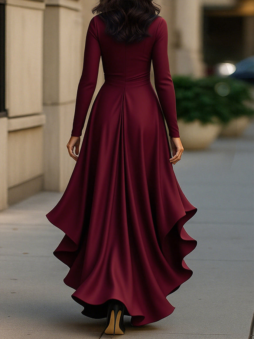 FJØRNA midnight blue satin maxi dress with draped design and ruffle details, perfect for elegant evening occasions.