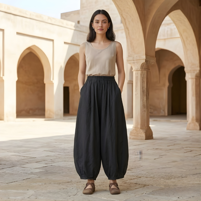 FJØRNA linen blend harem trousers for women with elastic waist and relaxed fit, shown in a casual, comfortable style.