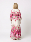 FJØRNA women's floral belted summer maxi dress with colorful pattern, sleeveless design, and flowing fabric.