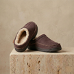 FJØRNA men's slip-on slippers with soft fabric upper and cushioned sole, perfect for indoor comfort and casual wear.