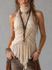 Ivory pleated halter neck chiffon sleeveless blouse for women by FJØRNA, showcasing the elegant pleated design and halter neckline.