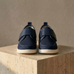 FJØRNA men's red mesh trainers with breathable fabric and velcro straps, ideal for comfortable casual wear.