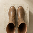 Tan leather men's knee-high boots with block heels from FJØRNA, featuring a sleek, stylish design and smooth leather finish.