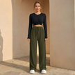 FJØRNA women's wide leg trousers with elastic waist and pleated design, showcasing relaxed fit and stylish fabric.