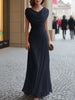 FJØRNA draped cowl-neck ruched maxi dress in soft fabric, featuring a flowing silhouette and elegant design.