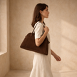 Vegan suede large handbag for women by FJØRNA, stylish bag with sleek design and spacious interior.