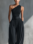 Lightweight summer women's trousers by FJØRNA with wide-leg design, perfect for vacation and warm-weather wear.