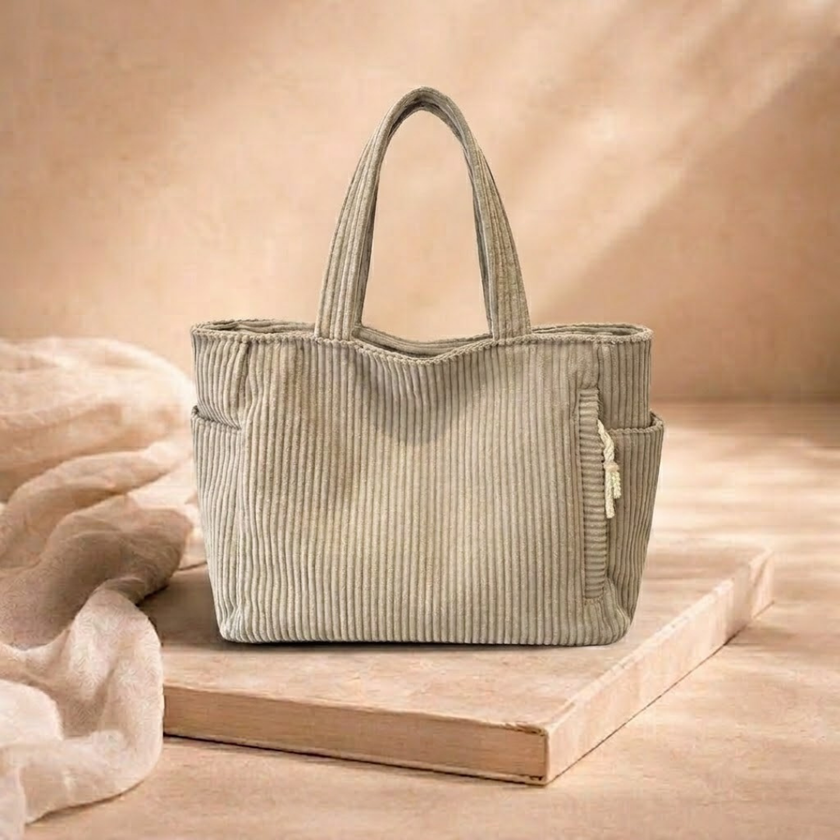 Large FJØRNA corduroy tote bag for women with spacious interior and stylish design, perfect for daily use.