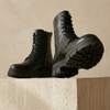FJØRNA men's leather combat boots with side zipper, orthopedic design, sturdy soles, and ankle-high style.