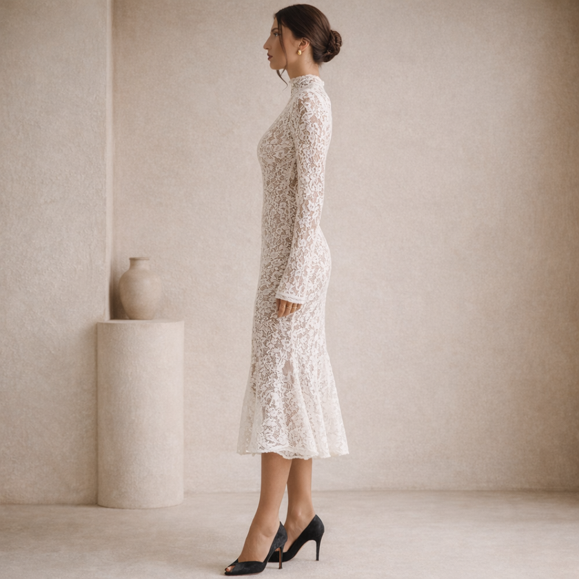 Ivory lace midi dress for women with high neck from FJØRNA, featuring intricate lace details and a elegant, feminine silhouette.