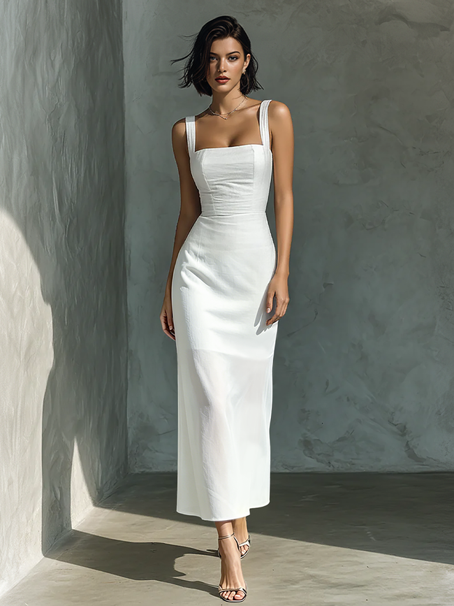 White cotton and linen blend sleeveless women's midi dress by FJØRNA, featuring a flowing, lightweight design perfect for warm weather.