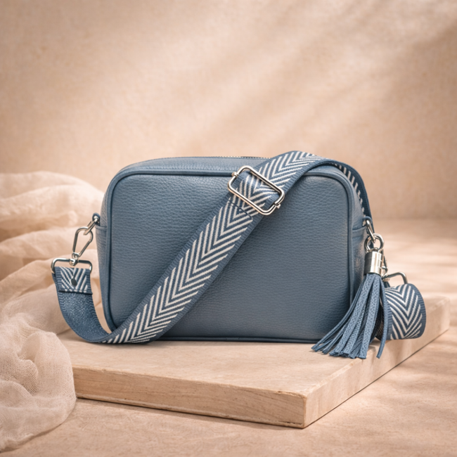 FJØRNA genuine leather chevron strap crossbody bag for women, featuring a stylish design and adjustable strap.
