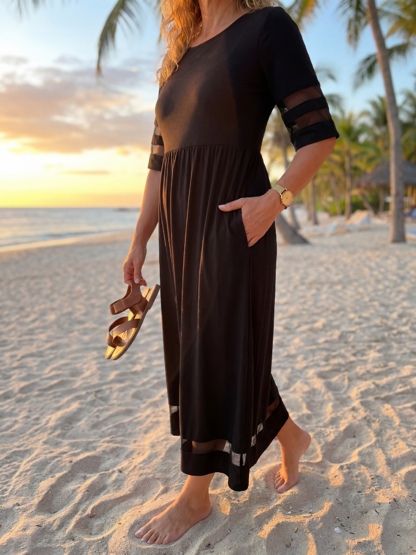 FJØRNA elegant midi wrap dress for women, featuring a sophisticated evening design with flowing fabric and a fitted waist.