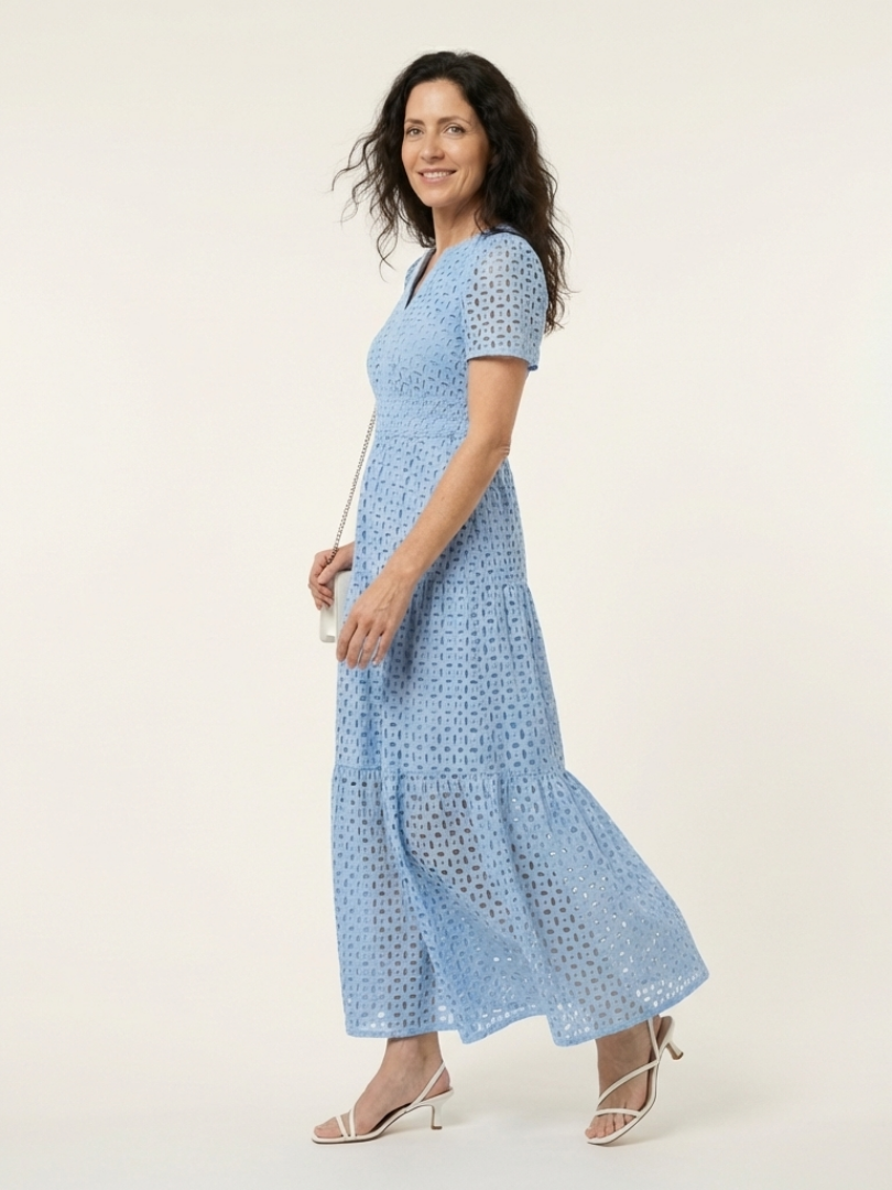 FJØRNA summer midi dress for women featuring short sleeves, wrap style, flowy fabric, and tailored fit.