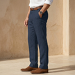 FJØRNA linen blend straight leg men's trousers, tailored fit, featuring a classic waistband and side pockets.