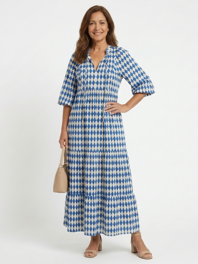 FJØRNA women's summer midi dress with a colorful print, wrap style, sleeveless design, perfect for warm weather and casual occasions.