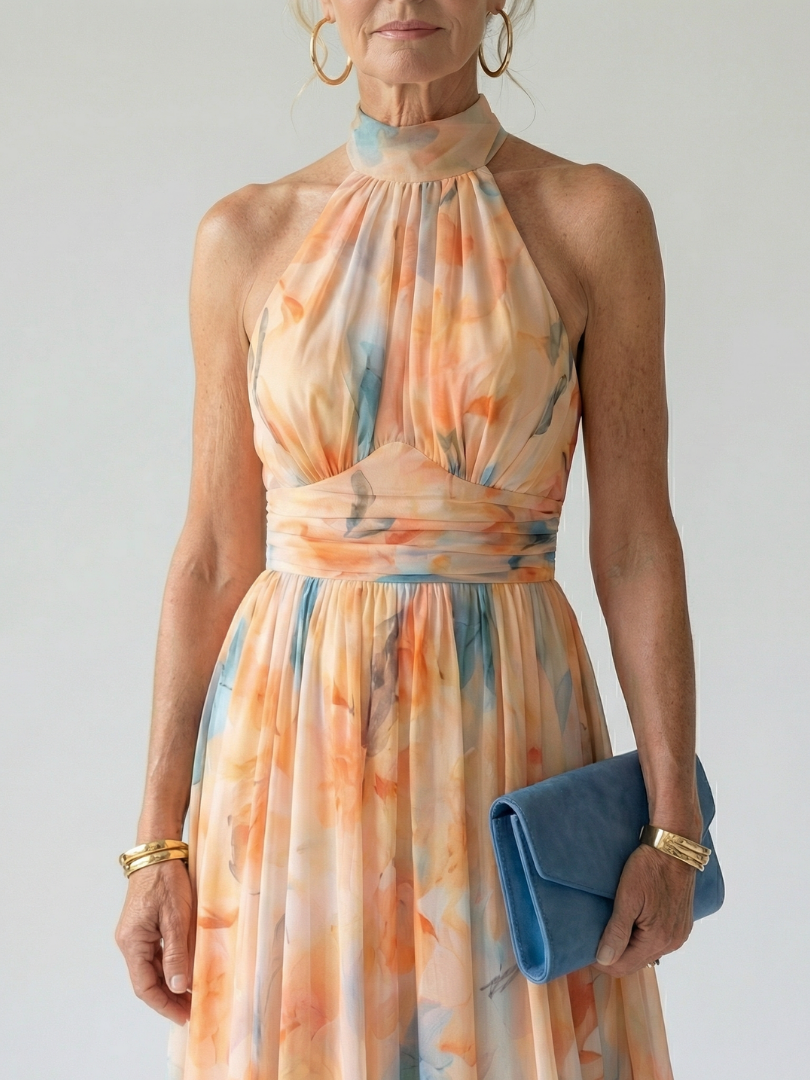FJØRNA women's summer midi dress with halter neck and sleeveless design, perfect for warm weather and casual outings.