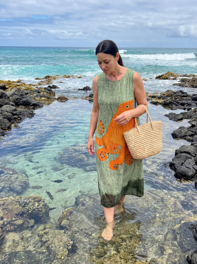 FJØRNA women's summer midi dress with a vibrant print, sleeveless wrap style, perfect for warm weather and casual outings.