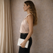 FJØRNA men's satin top, stylish satin sleeveless shirt with a smooth, shiny finish, displayed on a neutral background.