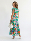 FJØRNA women's floral tiered summer midi dress with a flowy, feminine design and lightweight fabric.