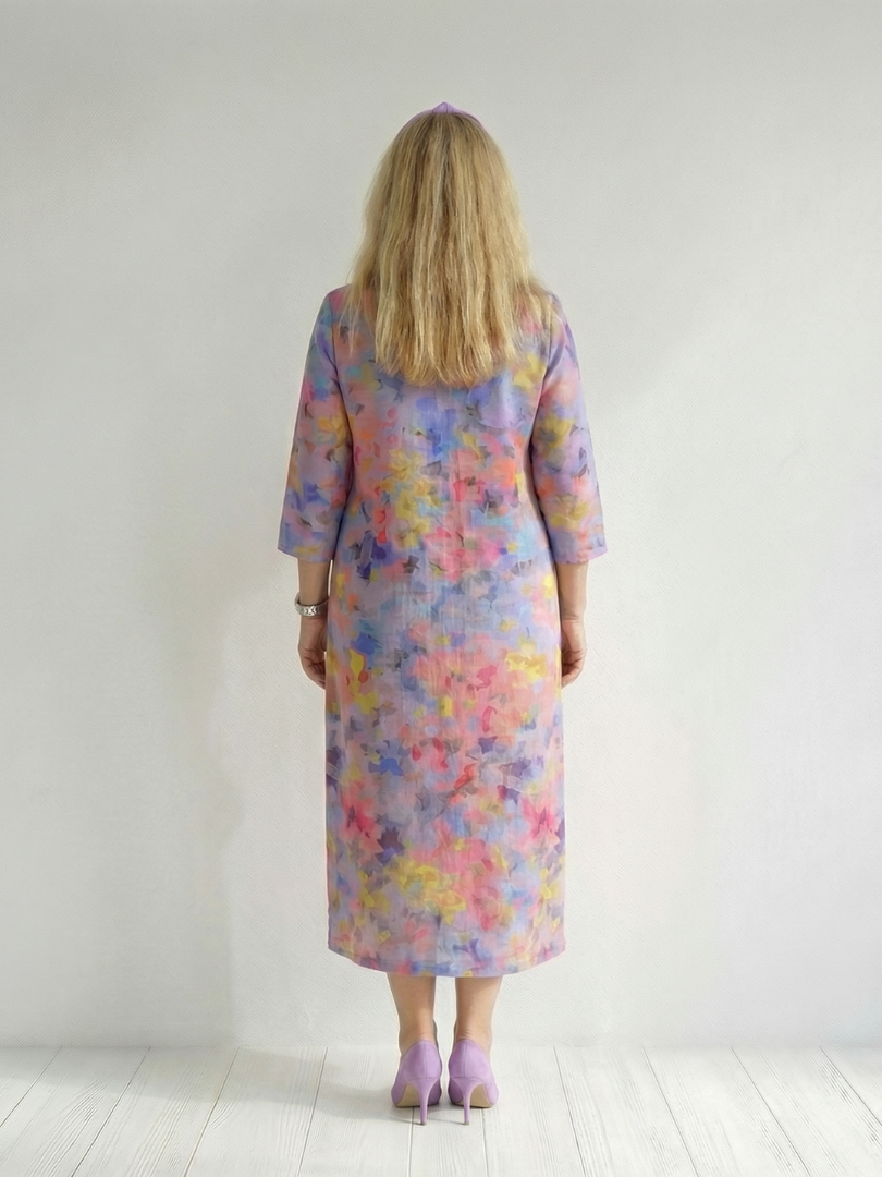 FJØRNA women's summer midi dress with floral print, long sleeves, flowy relaxed fit, perfect for warm weather.