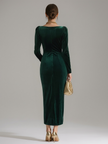 FJØRNA velvet midi dress for evening wear, featuring a fitted silhouette and elegant design, shown in a rich fabric and stylish cut.