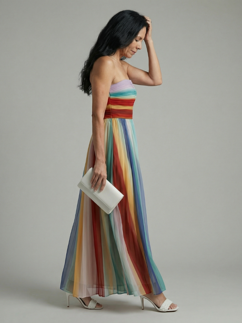 FJØRNA women's summer maxi dress with striped strapless design and pleated fabric, flowing and stylish for warm weather.