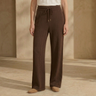 FJØRNA women's knit lounge trousers with cable knit pattern, soft and cozy pants for relaxed wear.
