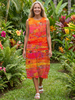 FJØRNA women's sleeveless summer midi dress with wrap design, flowy lightweight fabric, perfect for warm weather.