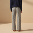 Women's striped drawstring trousers by FJØRNA, featuring a relaxed fit and stylish pattern, shown on a model.