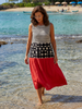 FJØRNA women's summer midi dress with blue and white stripes, sleeveless casual style, flowing fabric, and round neckline.