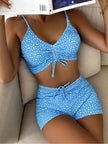 FJØRNA women's printed tankini set with flattering fit, featuring colorful patterns and supportive swimwear design.