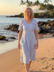 FJØRNA women's summer midi dress with short sleeves, striped pattern, pockets, perfect for warm weather.
