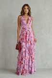 FJØRNA elegant floral maxi dress for women with halter neck and flowy design, perfect for summer or special occasions.